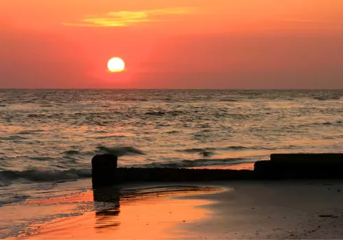 A sunset on the water, such that you can experience while on Sunset Cruises in St. Petersburg FL