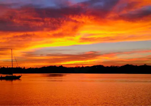 A sunset being viewed from a boat while on Sunset Cruises near St. Petersburg FL